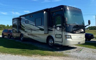 Photo of a 2011 Tiffin Allegro Open Road Red Class A Motorhome & 2016 Jeep Cherokee Trailhawk for sale