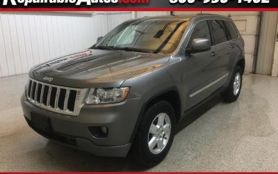 Photo of a 2013 Jeep Grand Cherokee Laredo 4WD Repairable Hail Damage for sale