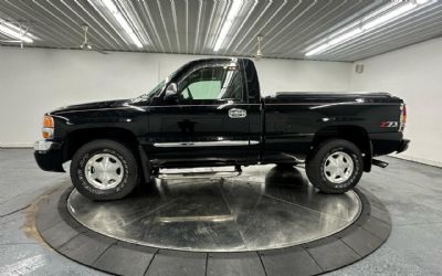 Photo of a 2004 GMC Sierra 1500 4WD Reg Cab 119.0