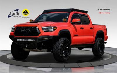 Photo of a 2023 Toyota Tacoma TRD Pro V6 Lift Upgraded Wheels & Tires Magnuson Superchar for sale