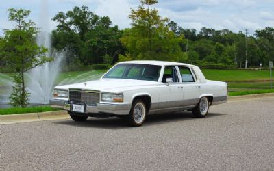 Photo of a 1990 Cadillac Fleetwood Brougham, Cold AC, Vogue Tires, Garage Kept, Classic American Luxury Sedan for sale