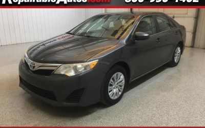 Photo of a 2014 Toyota Camry LE Repairable Hail Damage for sale