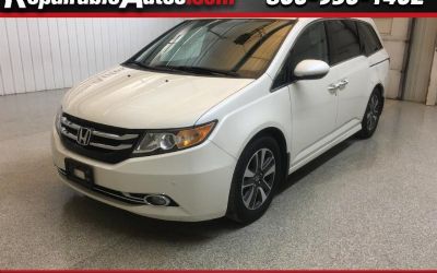 Photo of a 2016 Honda Odyssey Touring Repaired Theft Damage for sale