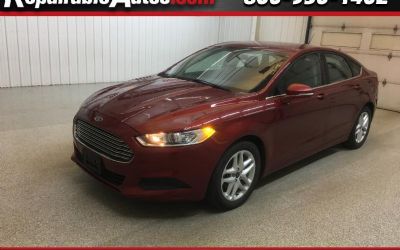 Photo of a 2016 Ford Fusion SE Repairable Hail Damage for sale