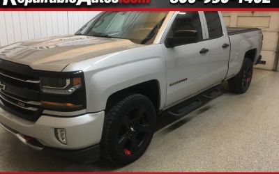 Photo of a 2018 Chevrolet Silverado 1500 LT Extended Cab 4WD Repairable Hail Damage for sale