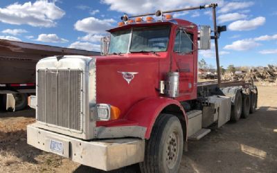 Photo of a 1988 Peterbilt 357 Roll Off Truck for sale