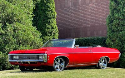 Photo of a 1969 Chevrolet Impala Very Nice Bright Red Ragtop for sale