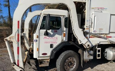 Photo of a 2017 Peterbilt Mammoth Front Loader Garbage Truck for sale