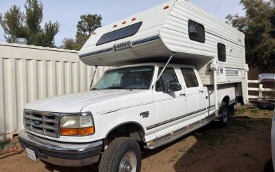Photo of a 1997 Ford F-350 XL Crew Cab 4WD With Lance Camper for sale
