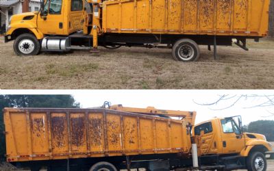 Photo of a 2012 Petersen TL3 Lightning Loader Grapple Truck for sale