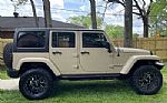 2016 Wrangler Unlimited Sahara Thumbnail 1