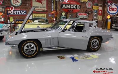 Photo of a 1965 Chevrolet Corvette Coupe Silver Pearl 365HP Top Flight “just IN” for sale